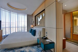 Junior Suite Bedroom Wider Angle facing window